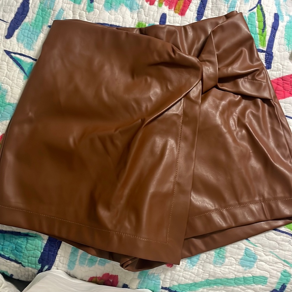 NWOT Zenana size small but fits like a medium/large leather skirt NEVER WORN